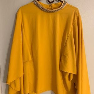 Cape yellow blouse